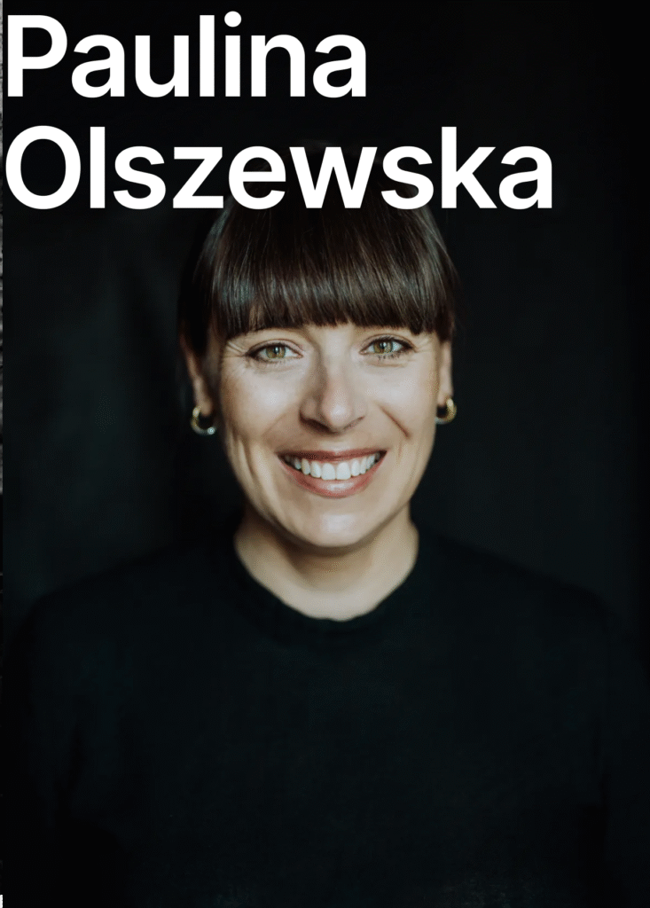 On the dark background there is a picture of a person - Paulina Olszewska. She has a pony, wears earrings and has a wide smile with white teeth visible. She is wearing a black shirt.