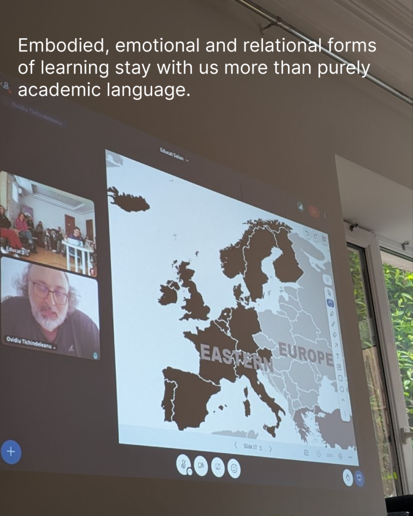The picture is a shot during the online presentation with a speaker. The speaker is seen on the left side. He is wearing glasses and has grey hair. On the right there is a map of Europe with countries marked black and grey. There is a text in the background: embodied, emotional and relational forms of learning stay with us more than purely academic language. 
